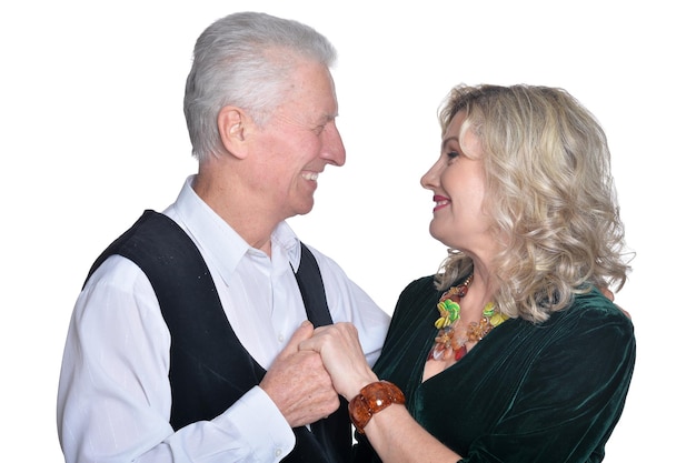 Portrait of happy senior couple hugging isolated