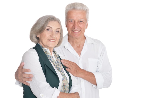 Portrait of happy senior couple posing isolated on white background