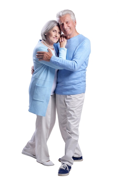 Portrait of happy senior couple posing isolated on white background