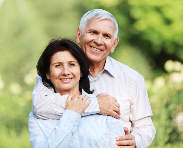 Portrait of happy senior couple smiling