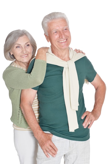 Portrait of a happy senior couple at white background