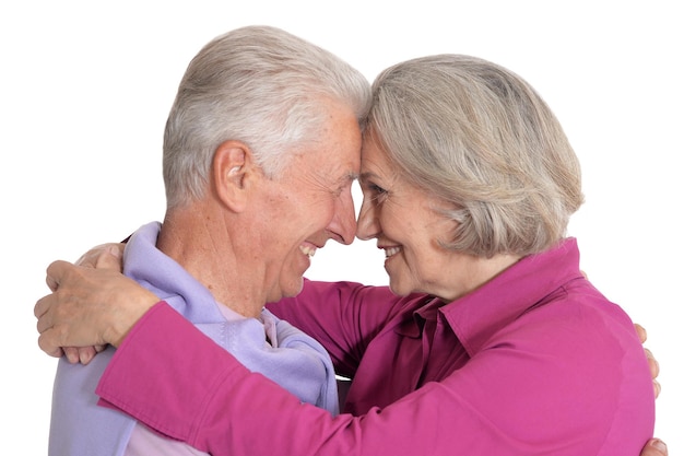 Portrait of happy senior couple on white background