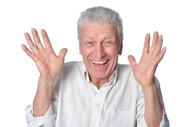 Portrait of happy senior man isolated on white background