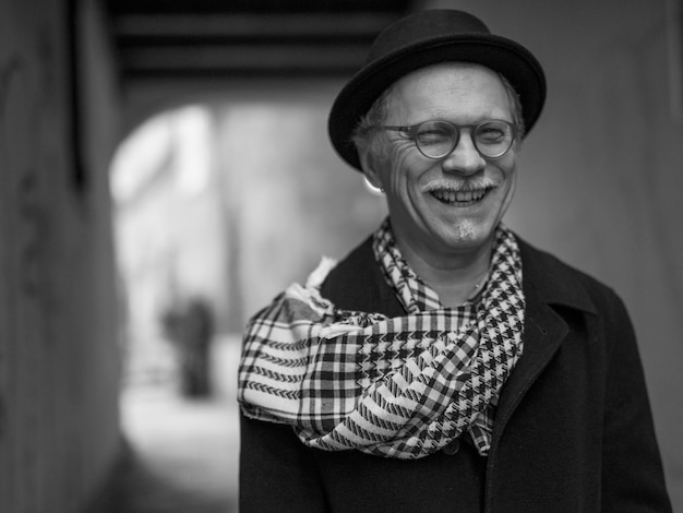 portrait of happy senior man wearing hat