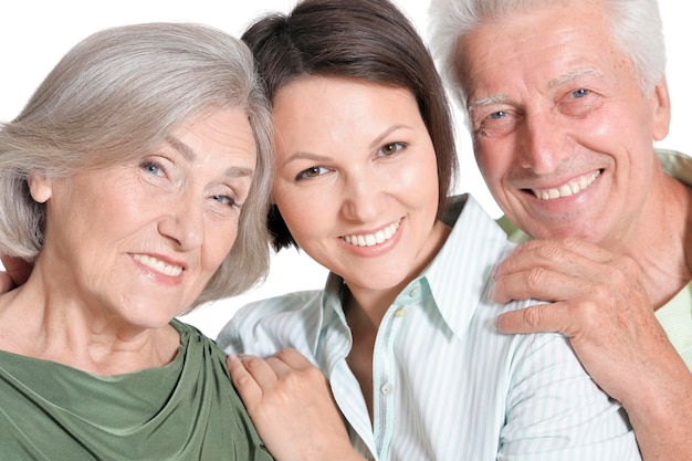 Portrait of a happy senior parents with daughter isolated