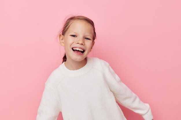 Portrait of happy smiling child girl gesture hands emotions grimace childhood unaltered