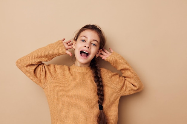 Portrait of happy smiling child girl joy posing emotions fashion childhood unaltered