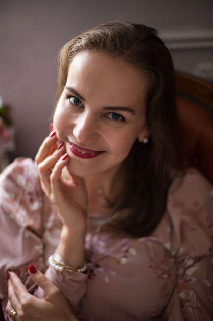 Portrait of happy smiling girl with red lips