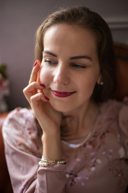 Portrait of happy smiling girl with red lips