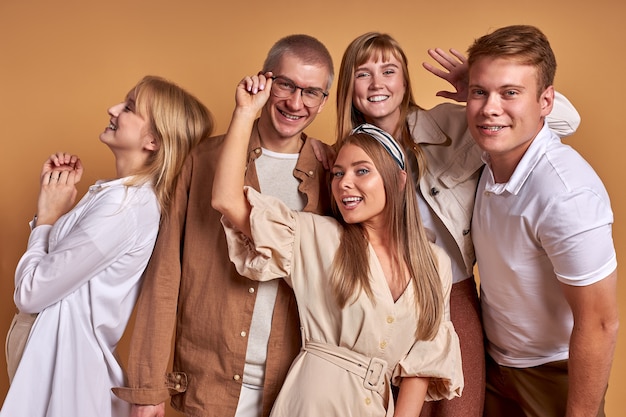 Portrait of happy smiling group of youth posing together