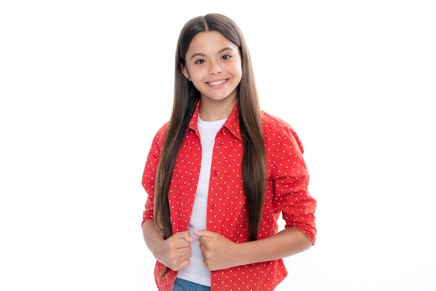 Portrait of happy smiling teenage child girl Little kid girl 1213 14 years old on isolated background Children studio portrait Emotional kids face