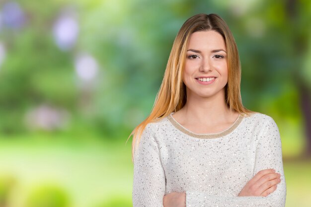 Portrait of happy smiling young beautiful woman