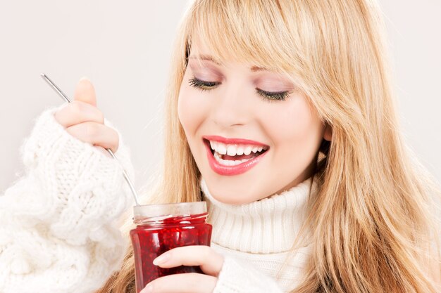 portrait of happy teenage girl with raspberry jam