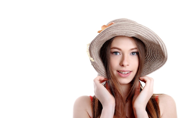 Portrait of happy tourist woman in hat on holiday on white backgraund