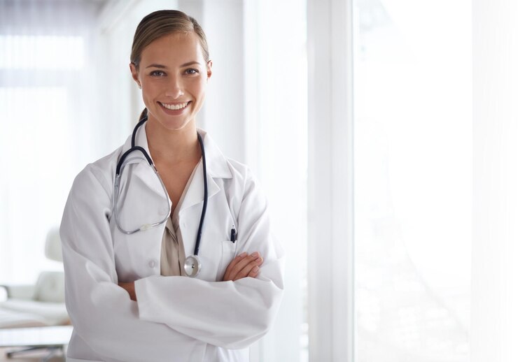 Photo portrait of happy woman arms crossed and doctor in hospital for healthcare wellness and clinic services female medical employee professional therapist and smile for trust integrity and mockup