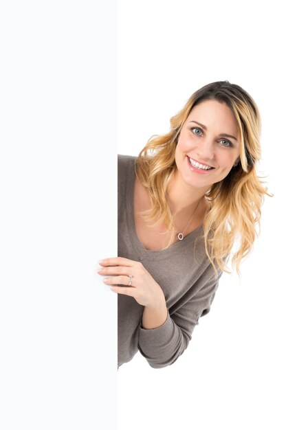 Portrait Of Happy Woman Holding Blank Billboard