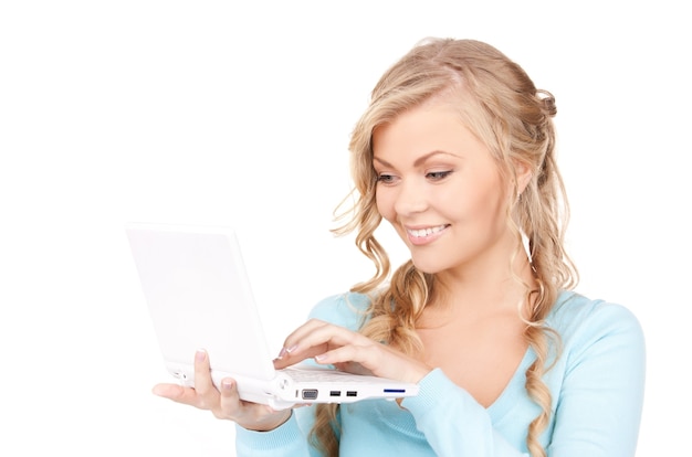 Portrait of happy woman with laptop computer