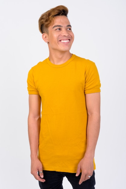 Premium Photo  Man in yellow t-shirt. space for your logo or design.  mockup for print