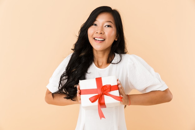 Portrait of a happy young asian woman