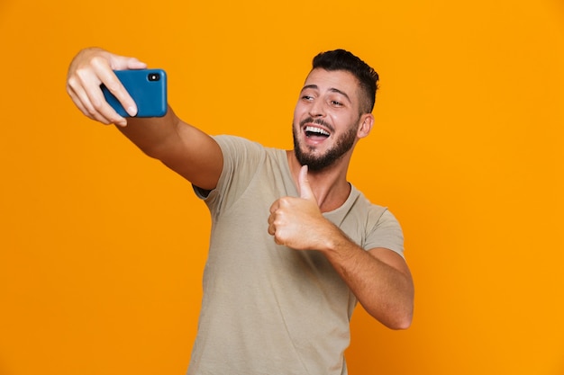 Portrait of a happy young bearded man