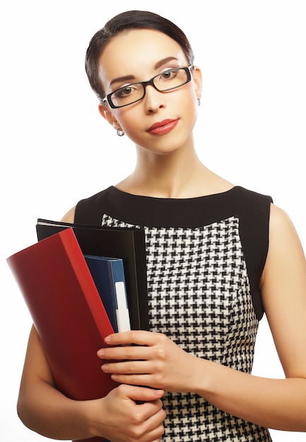 Photo portrait of happy young business woman with folders