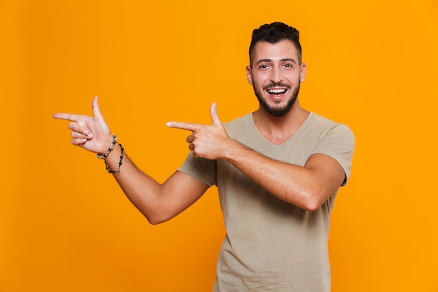 Portrait of a happy young casual man standing