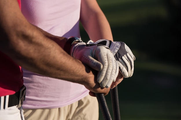 portrait of happy young  couple on golf course