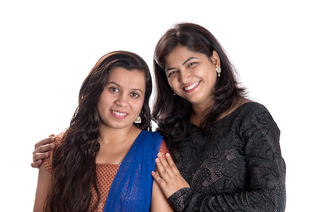 Portrait of happy young girls on a white