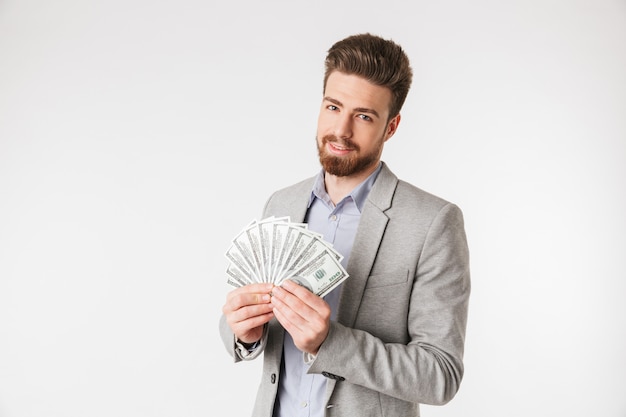 Portrait of a happy young man dressed in shirt and jacket