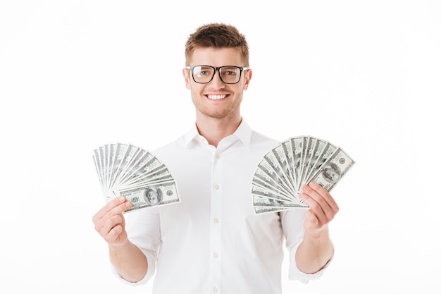 Portrait of a happy young man in eyeglasses