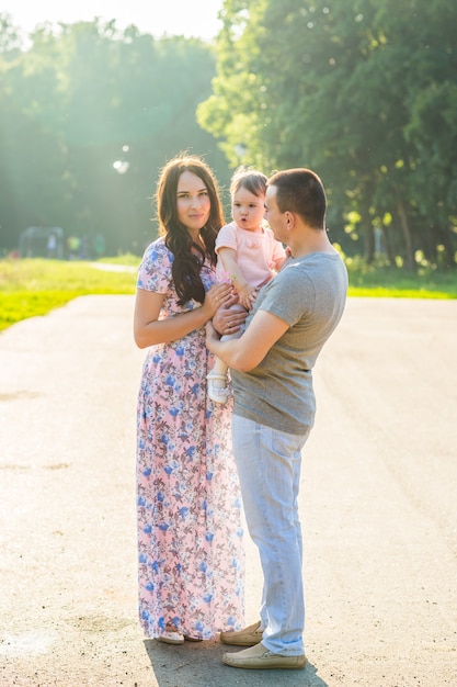 Portrait of happy Young Mixed Race Ethnic Family Outdoors