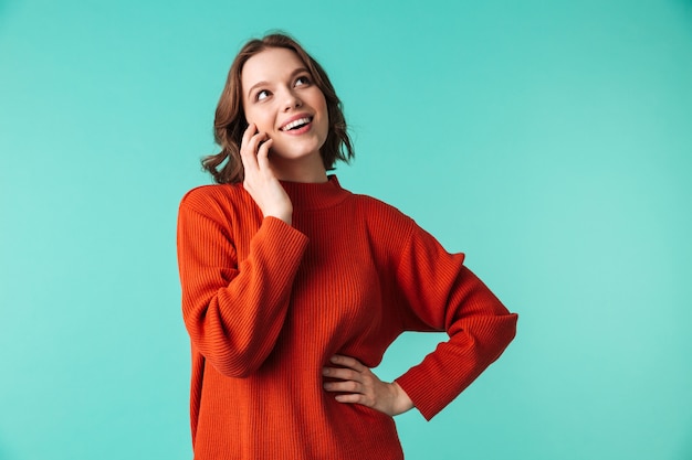 Portrait of a happy young woman dressed in sweater