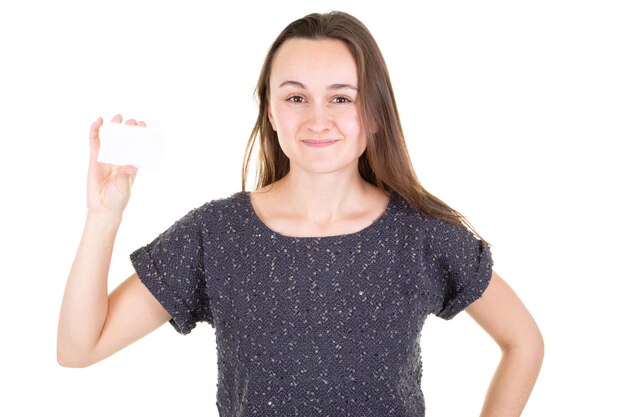 Portrait of happy young woman holding empty credit card on white background with copy space for text