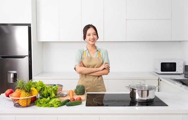 Photo portrait of a housewife in the kitchen at home