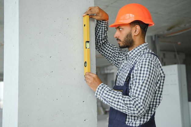 Portrait of a indian engineer posing at the camera