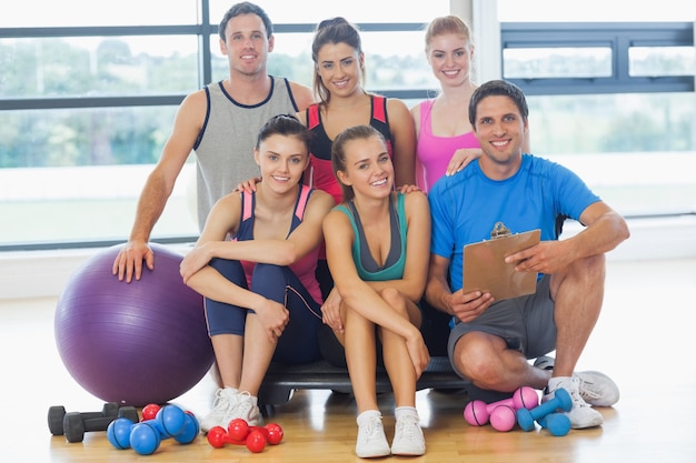 Portrait of an instructor with fitness class