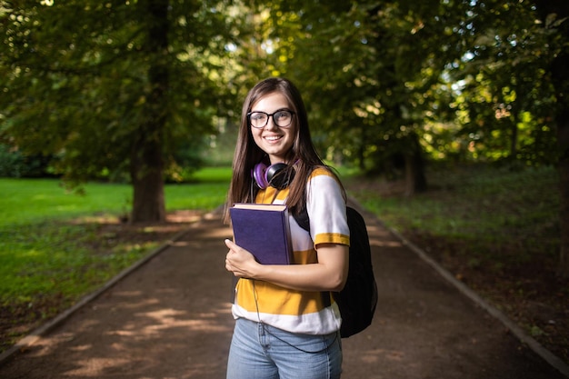 Portrait of joyful student girl on