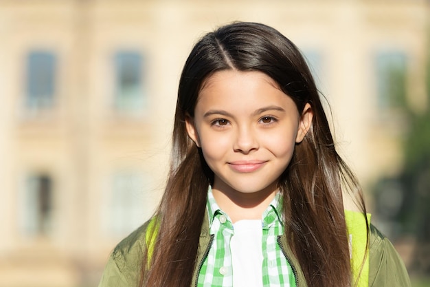 Portrait of kid with cheerful smiling face