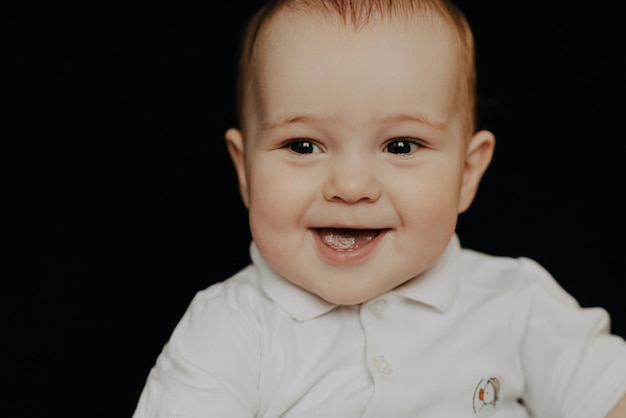 Portrait of a laughing little boy, Caucasian child kid