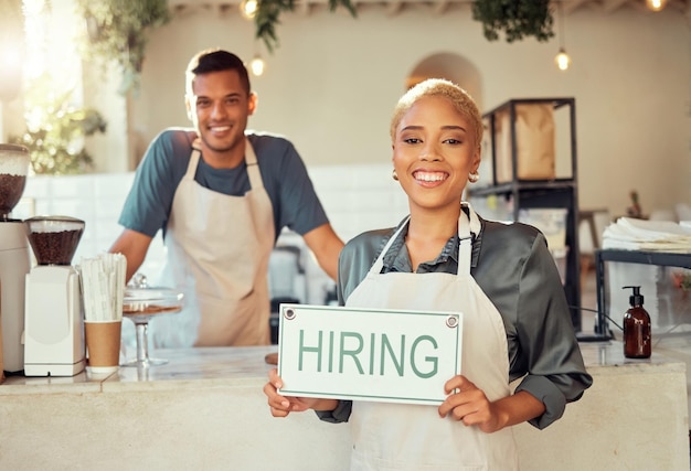 Photo portrait leader and hiring sign small business owner happy at coffee shop or cafe with employee team collaboration and recruitment due to startup growth and vacancy to join us for a job