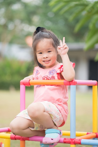 portrait little asian girl playing