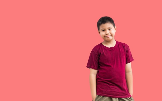 Portrait of little Asian kid boy handsome standing smiling happily confident gesture on a white background