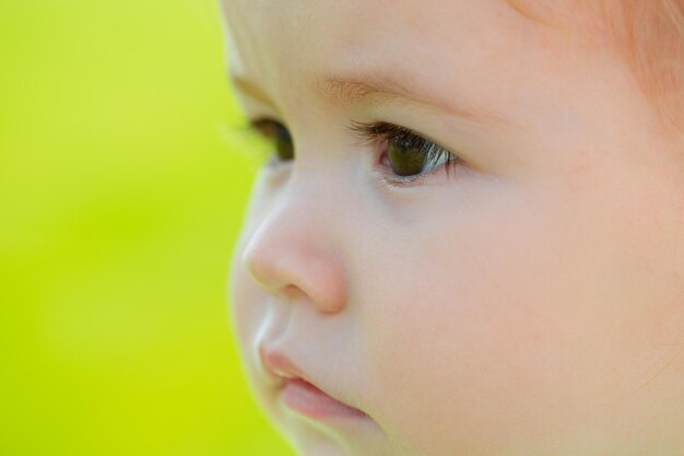 Portrait of little baby concept of kids macro cropped face closeup head shoot children portrait