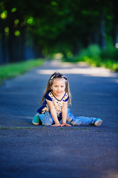 Portrait of little boy and girl outdoors