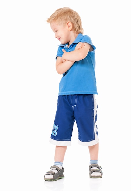 Portrait of little boy with hands folded isolated on white background