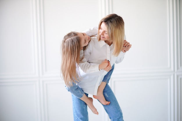 Portrait of little girl and her mother