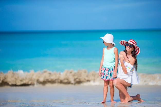 Portrait of little girl and mother on summer vacation