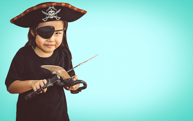 Portrait of little girl in pirate 