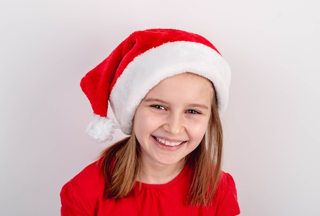 Portrait of little girl in santa hat