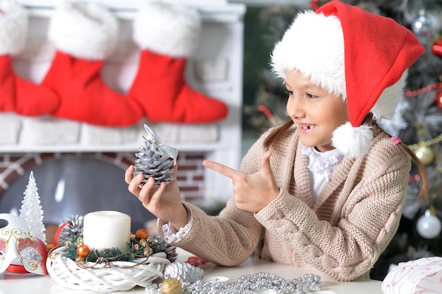 Portrait of little girl in santa hat